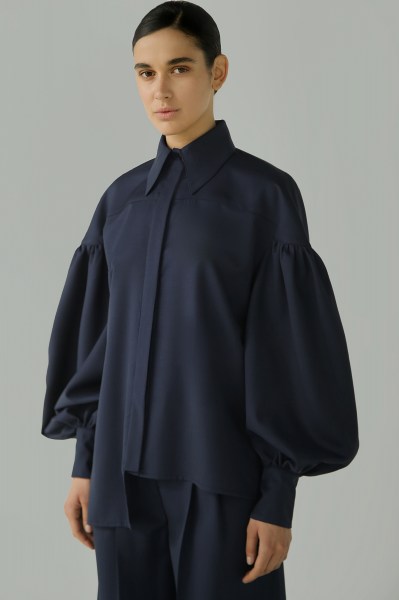 Camicia oversize asimmetrica FW25C06 01